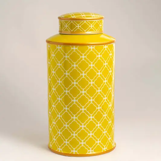 Yellow ceramic decorative storage jar with textured diamond pattern for modern shelf styling and elegant home decor.