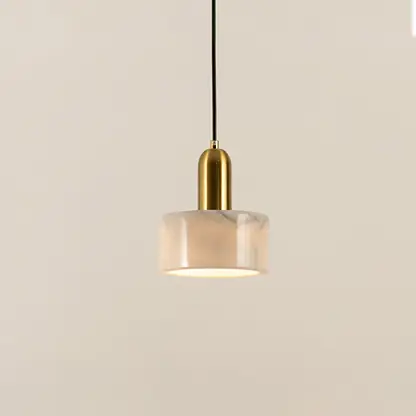 White marble pendant light with polished gold fittings crafted for stylish contemporary interiors.