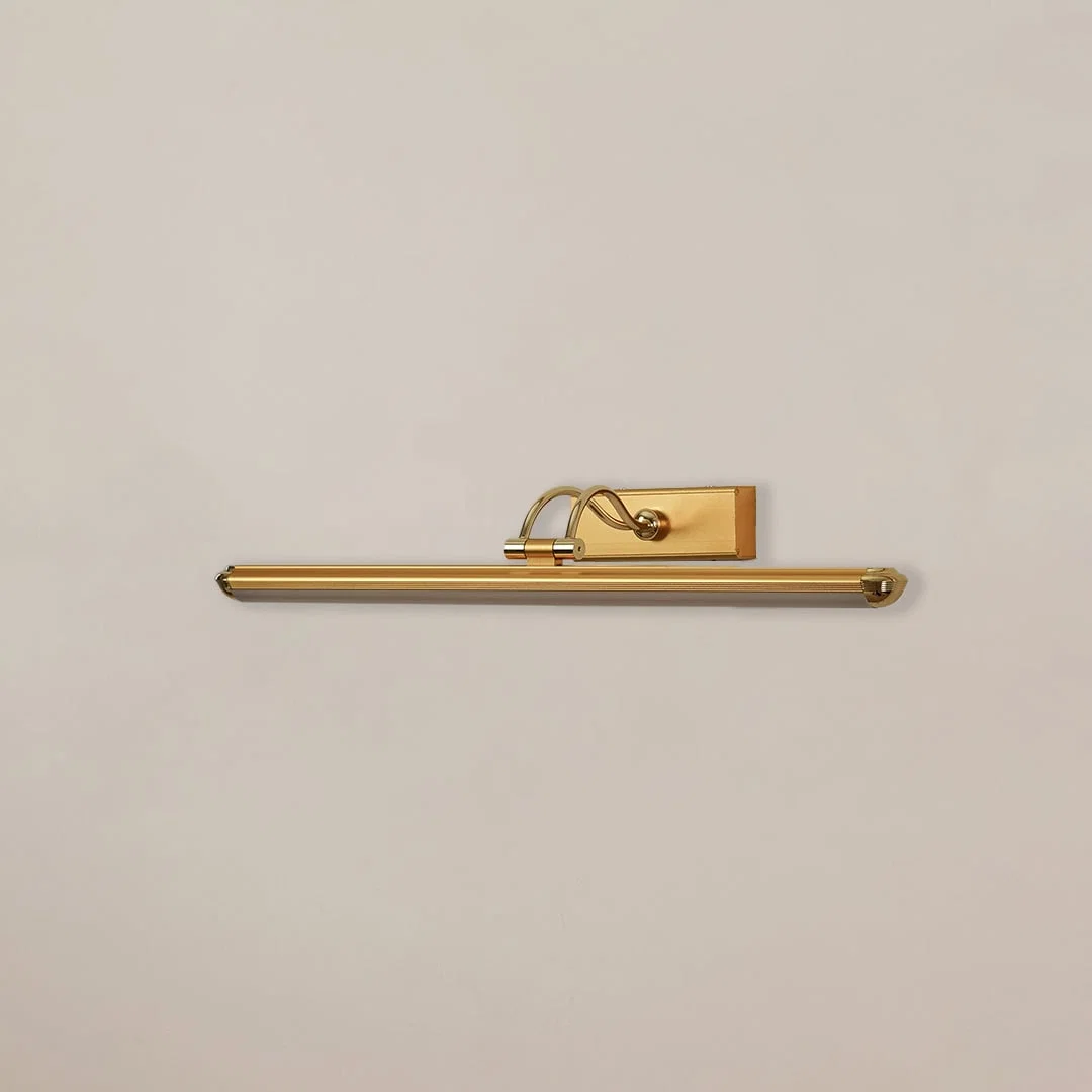 Gold adjustable picture light with light off shown on white background perfect for wall art lighting in living rooms and hallways.