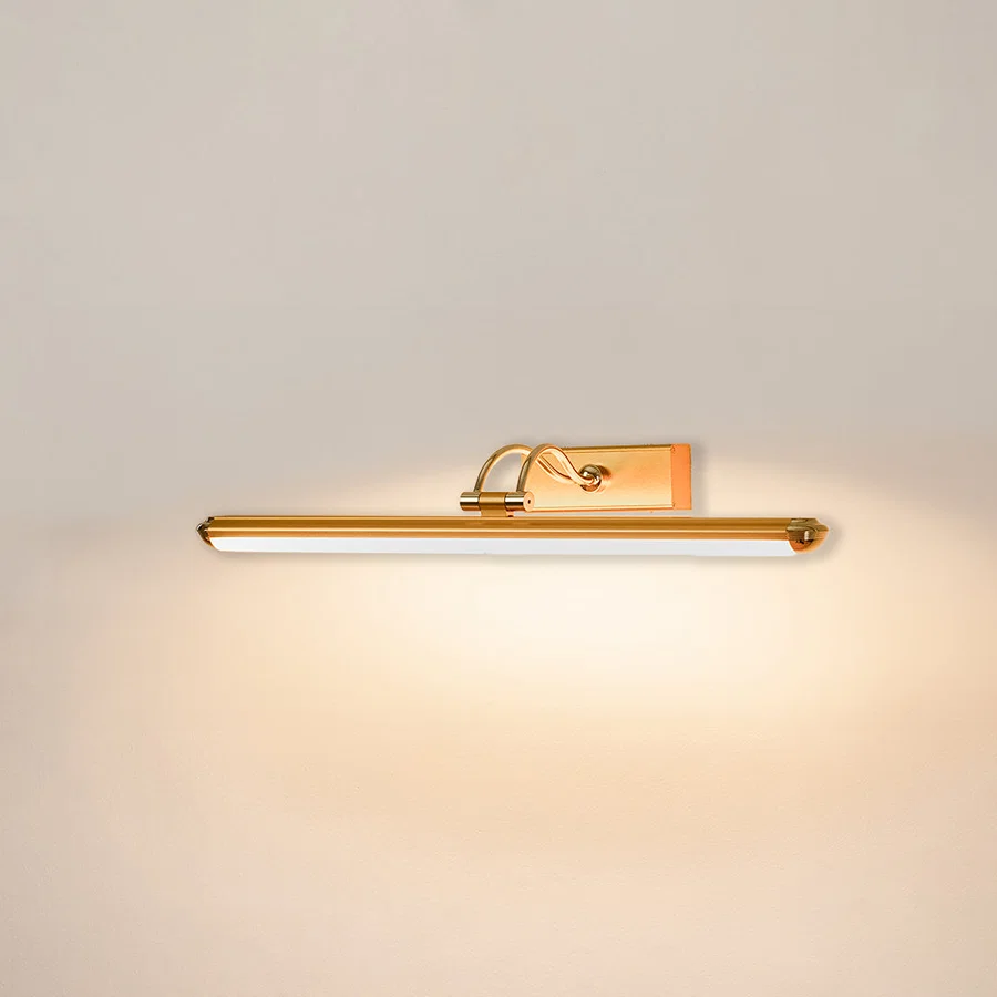 Contemporary wall light in gold metal finish with linear bar design for bathroom or vanity decor lighting white background.