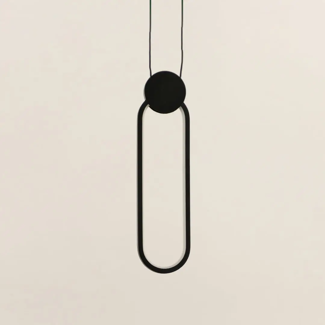 Closeup of black metal ring pendant light showcasing minimalist design and premium craftsmanship details.