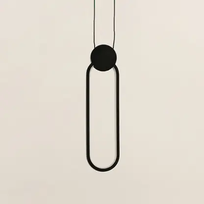Closeup of black metal ring pendant light showcasing minimalist design and premium craftsmanship details.