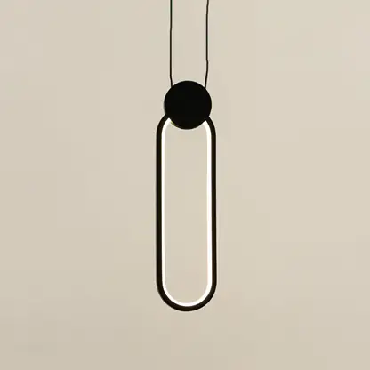 Modern black metal ring pendant light with sleek geometric styling designed for elegant interiors.