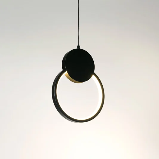 Modern white glass pendant light with brass details designed for sophisticated living and dining interiors.