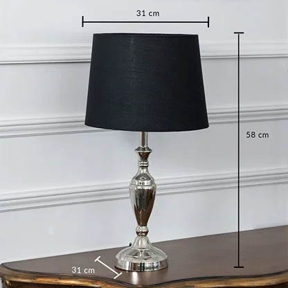 Black table lamp with brass base dimensions 31 cm width and 58 cm height showcasing its ideal fit for any space.