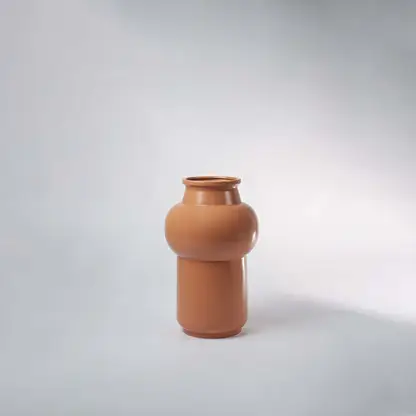 Brown ceramic vase on neutral background emphasizing its clean lines and elegant finish perfect for minimalistic decor styling.