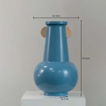 Blue sculptural metal vase shown with 43.5 cm height and 26.5 cm width offering a clear accurate size reference.