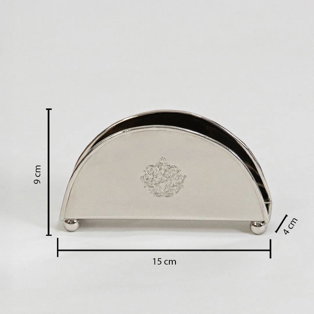 Brass napkin holder shown with labeled size 9 cm height 15.5 cm width and 4.5 cm depth on white background.
