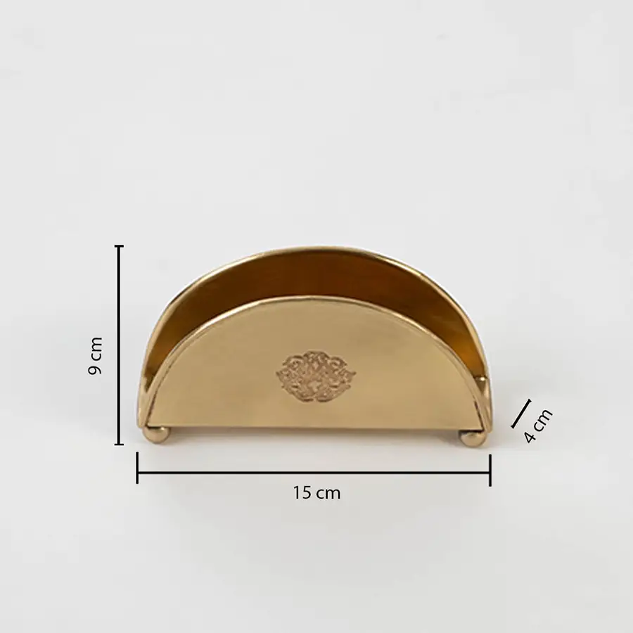 Brass napkin holder shown with labeled size 9 cm height 15.5 cm width and 4.5 cm depth on white background.