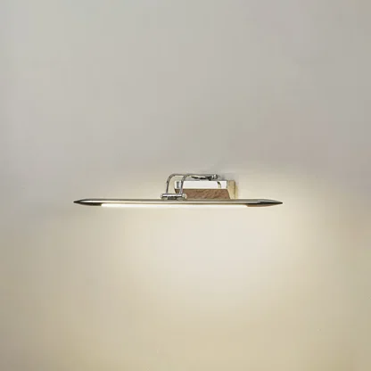 Minimal wall light in chrome metal finish with linear bar design for bathroom or vanity decor lighting white background.