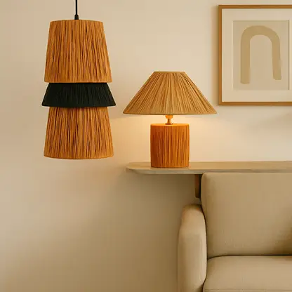 Table lamp and pendant light with woven shades light on placed beside a beige sofa creating a warm cozy modern interior look.