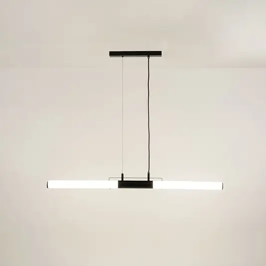 Black metal linear LED pendant light with integrated illumination creating sleek contemporary ceiling lighting indoors.