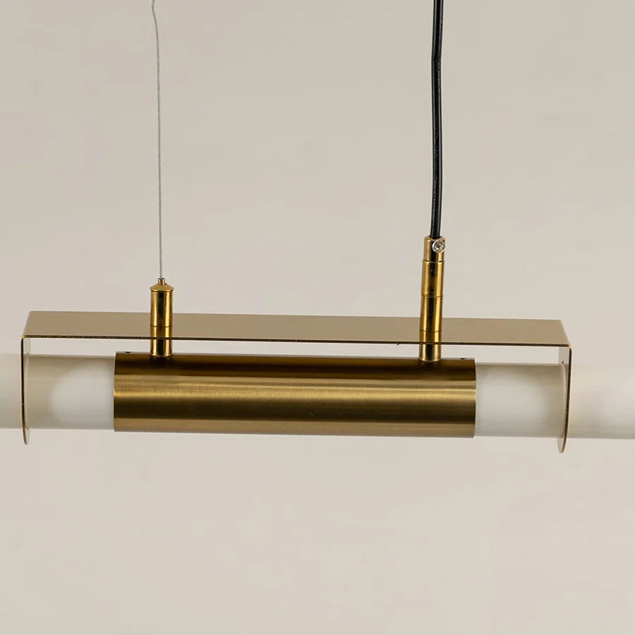 Gold metal linear LED pendant light highlighting refined metal construction and contemporary minimalist lighting design.