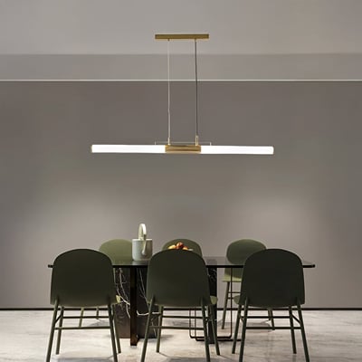 Gold metal linear LED pendant light above dining table creating elegant ambient lighting for modern dining interiors.