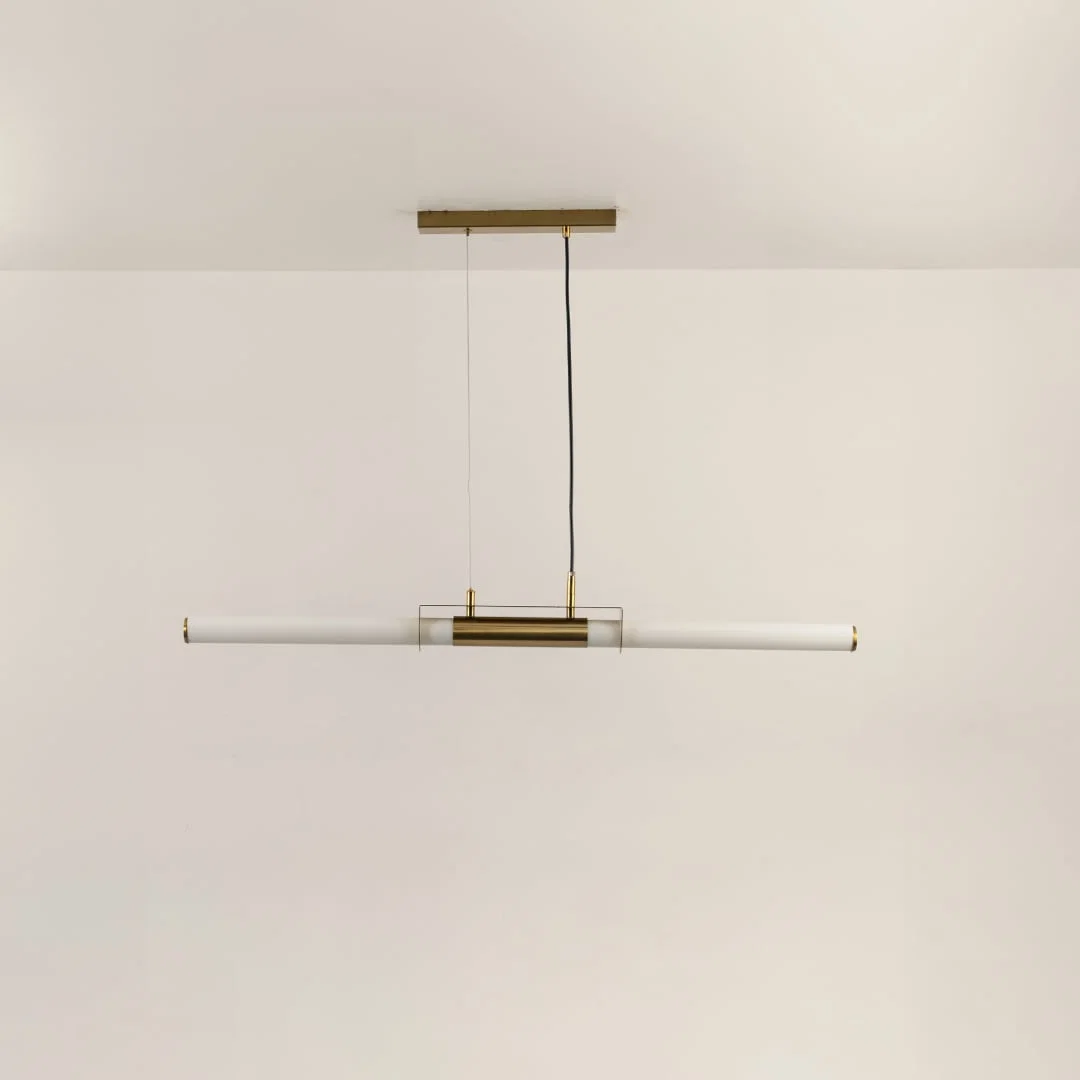 Gold metal linear LED pendant light with integrated illumination designed for elegant modern ceiling lighting indoors.
