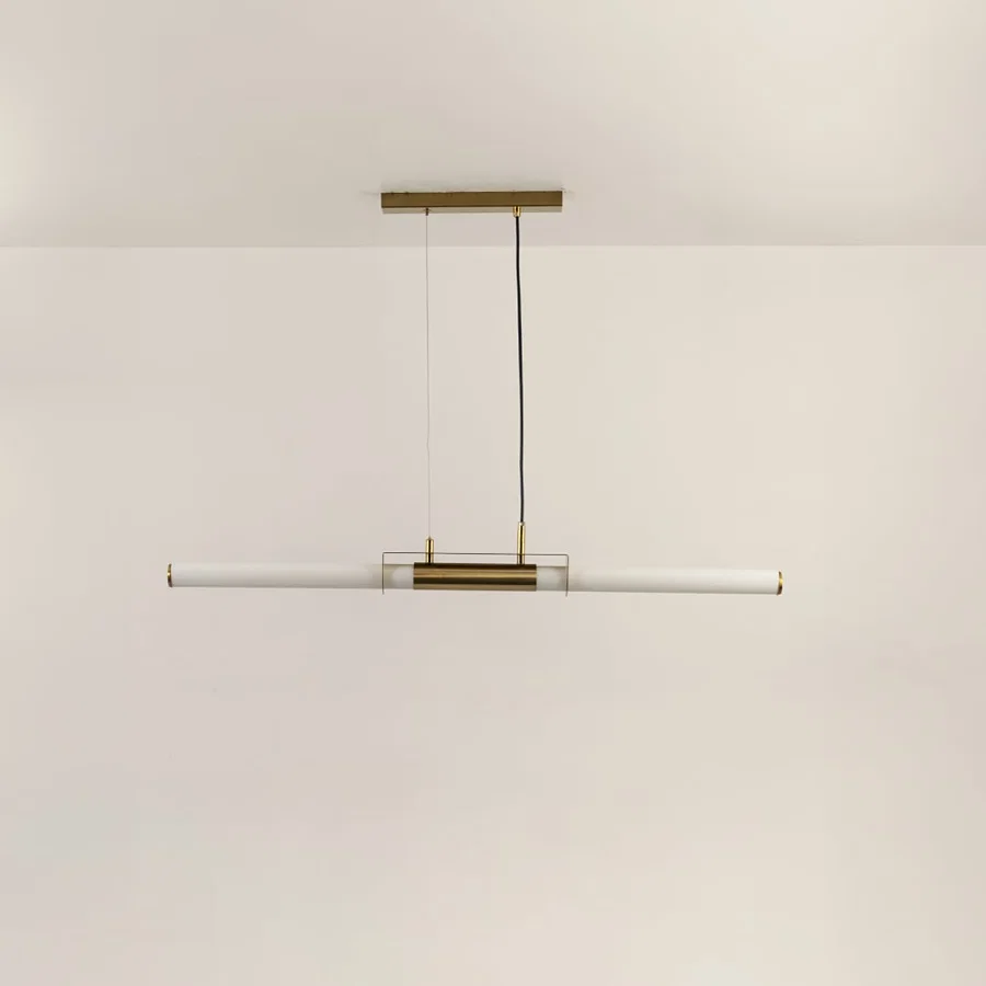 Gold metal linear LED pendant light with integrated illumination designed for elegant modern ceiling lighting indoors.