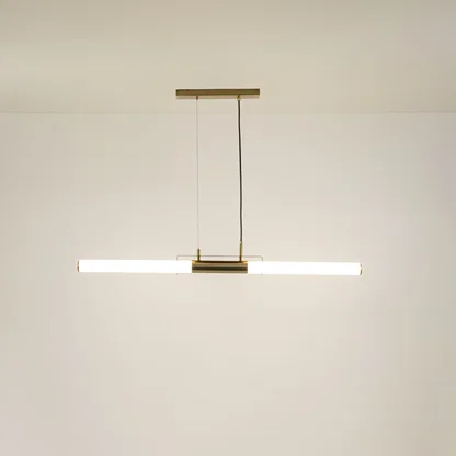 Gold metal linear LED pendant light with integrated illumination offering sleek contemporary ceiling lighting design.