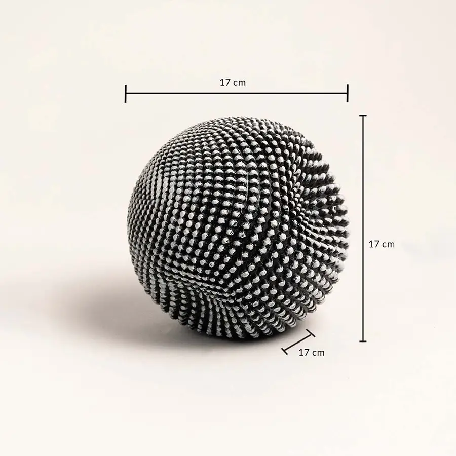 Textured black and white ball sculpture showing 17 cm height width and depth dimensions.