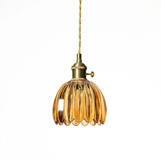 Amber textured glass pendant light with scalloped design crafted for sophisticated modern interiors.