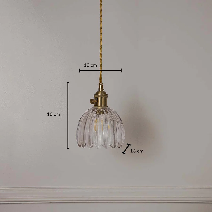 Dimension image of clear ribbed glass petal pendant light with brass accents showing 33 cm height and 14 cm width.