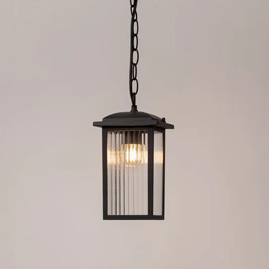 Modern outdoor pendant light in black metal with glass panels for entrance or patio decor lighting white background.