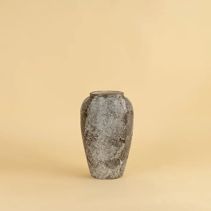 Rustic ceramic vase in grey brown textured stone look ideal for enhancing living room and entryway decor.
