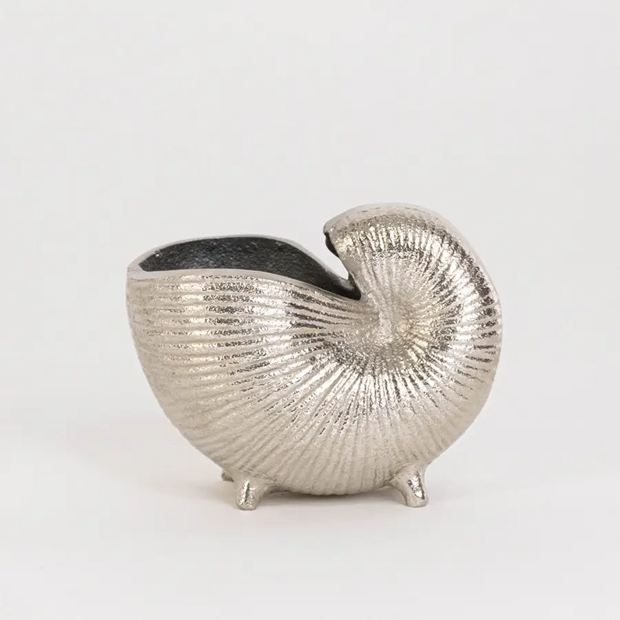 Decorative metal shell bowl in silver finish with textured design for table decor or shelf styling modern home placement white background.