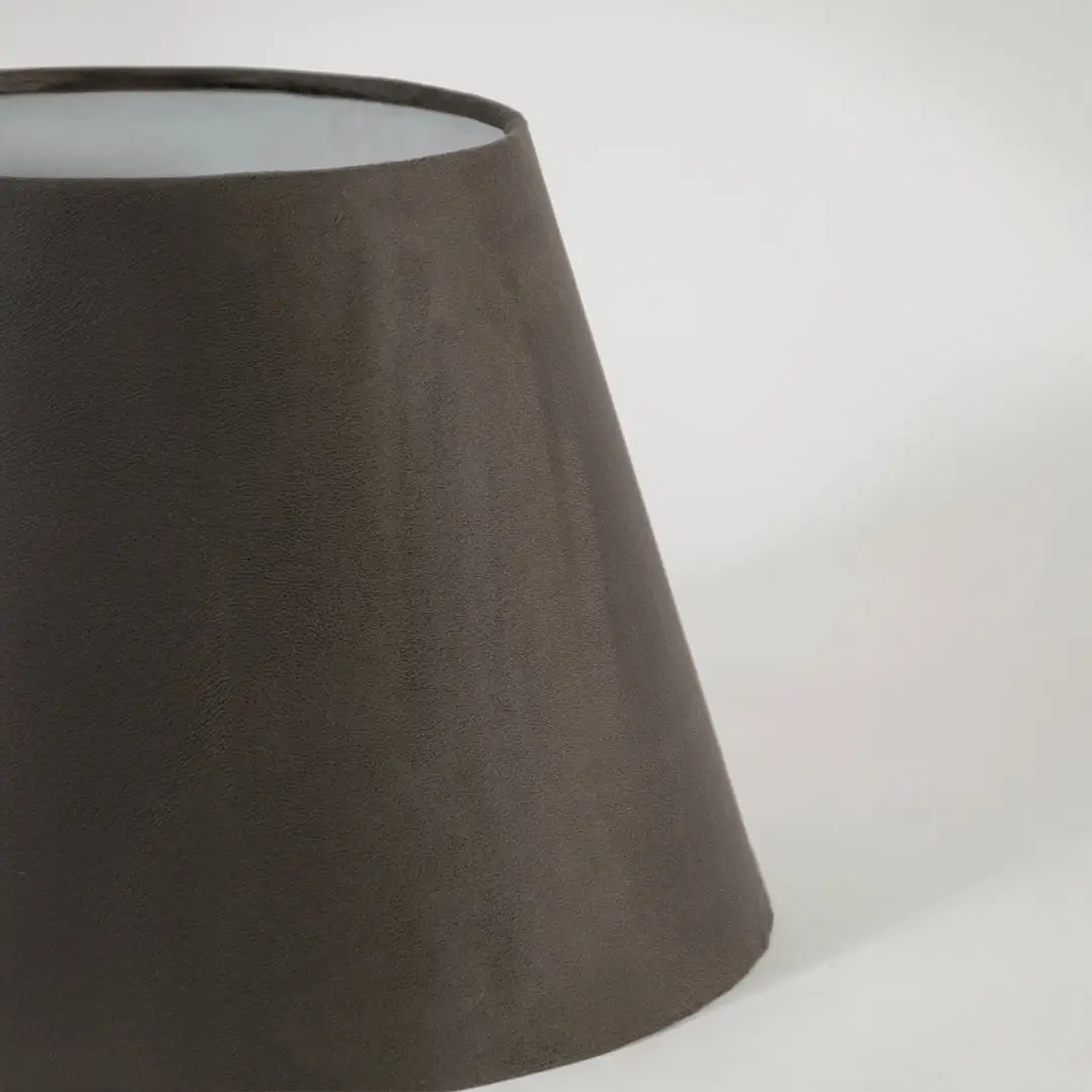 Closeup view of the brown tapered lampshade showing its velvet texture and fine detailing for a clear and refined product presentation.