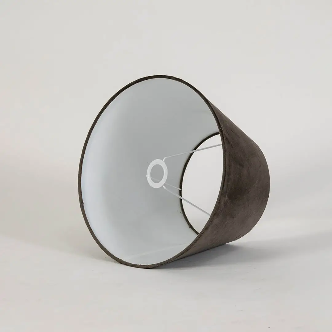Brown tapered lampshade displayed on a clean white background highlighting its smooth fabric texture and classic wide base shape.