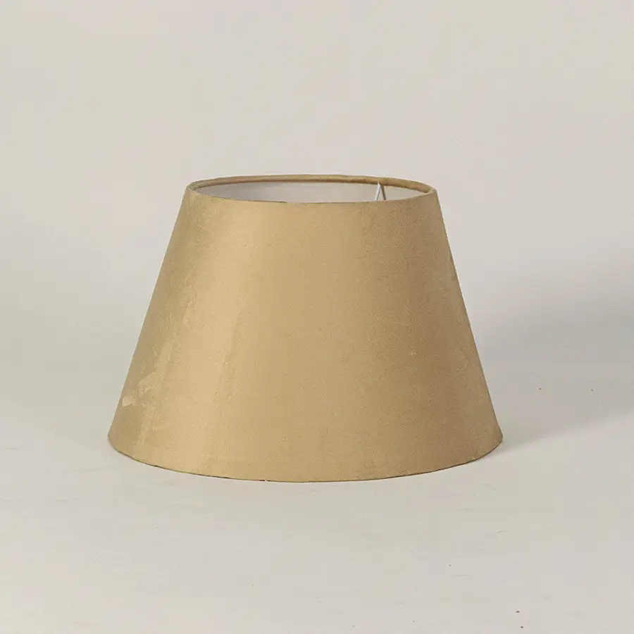 Elegant fabric lampshade in beige finish for table or floor lamp soft lighting and home decor placement white background.

