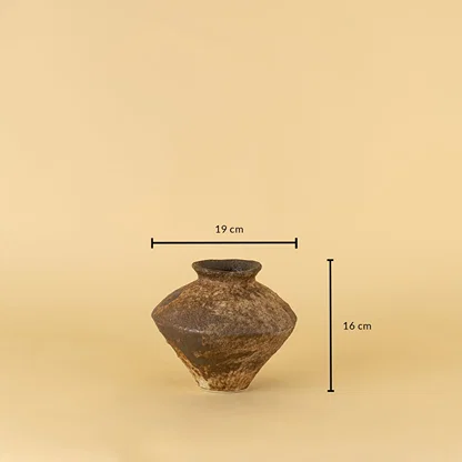 Rustic brown ceramic vase with handcrafted texture shown with 16 cm height and 19 cm width for size reference.