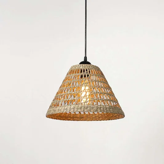 Woven bamboo pendant light with wide dome shape and geometric pattern texture suspended against clean neutral wall background for modern natural decor.

