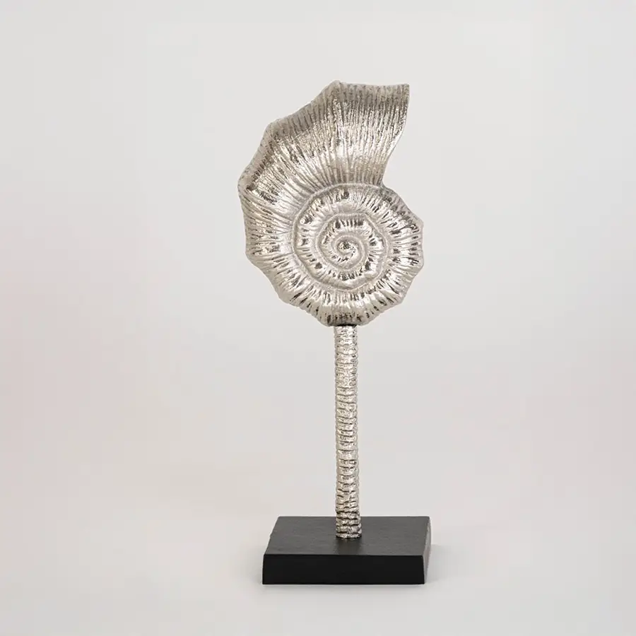 Decorative silver spiral sculpture on a black stand displayed against a clean white background showing its textured artistic design