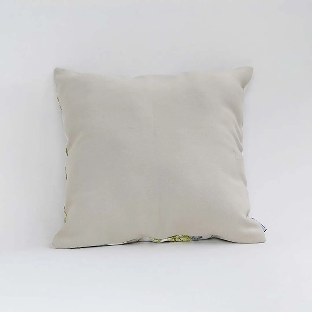 Backside of the cushion cover in soft beige cotton fabric offering a clean minimal décor style with a breathable durable and skin friendly material suitable for modern home settings.