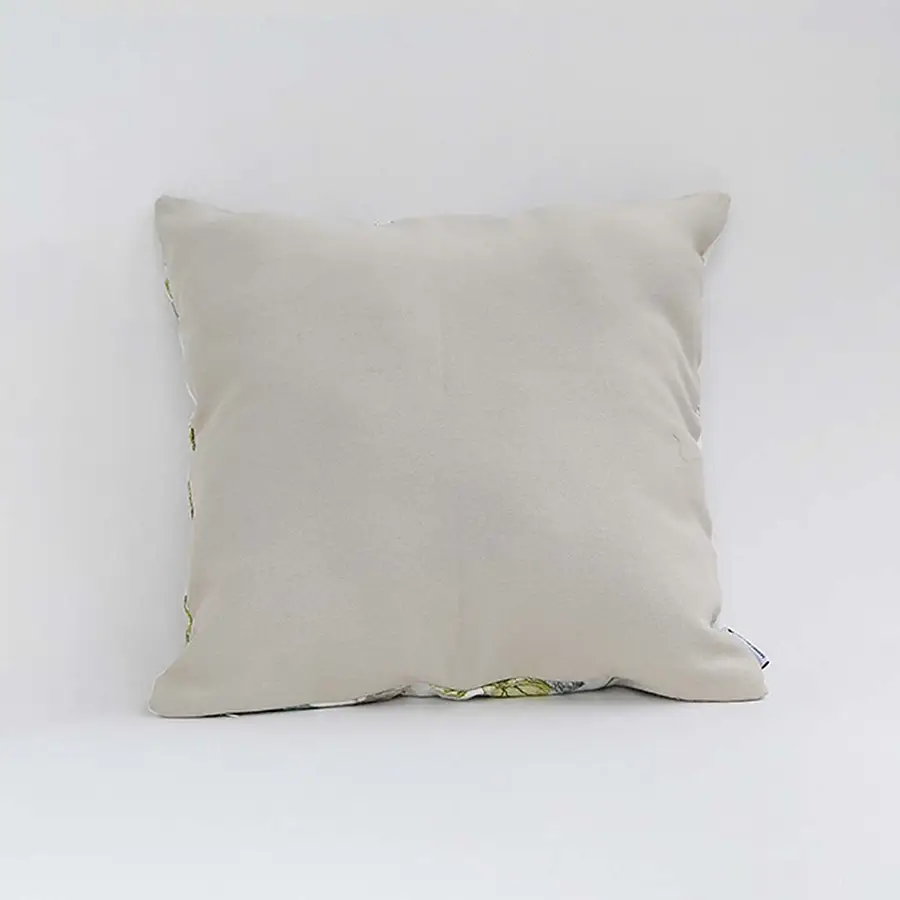 Backside of the cushion cover in soft beige cotton fabric offering a clean minimal décor style with a breathable durable and skin friendly material suitable for modern home settings.