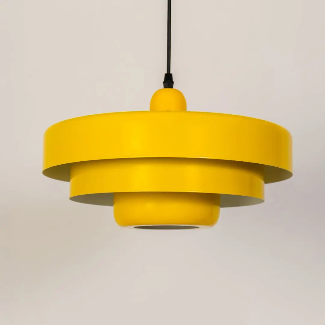 Yellow metal pendant light with layered shade ideal for kitchen dining room and ceiling decor.