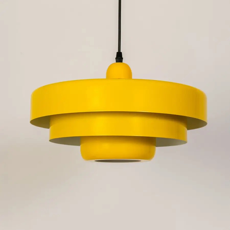 Yellow metal pendant light with layered shade ideal for kitchen dining room and ceiling decor.