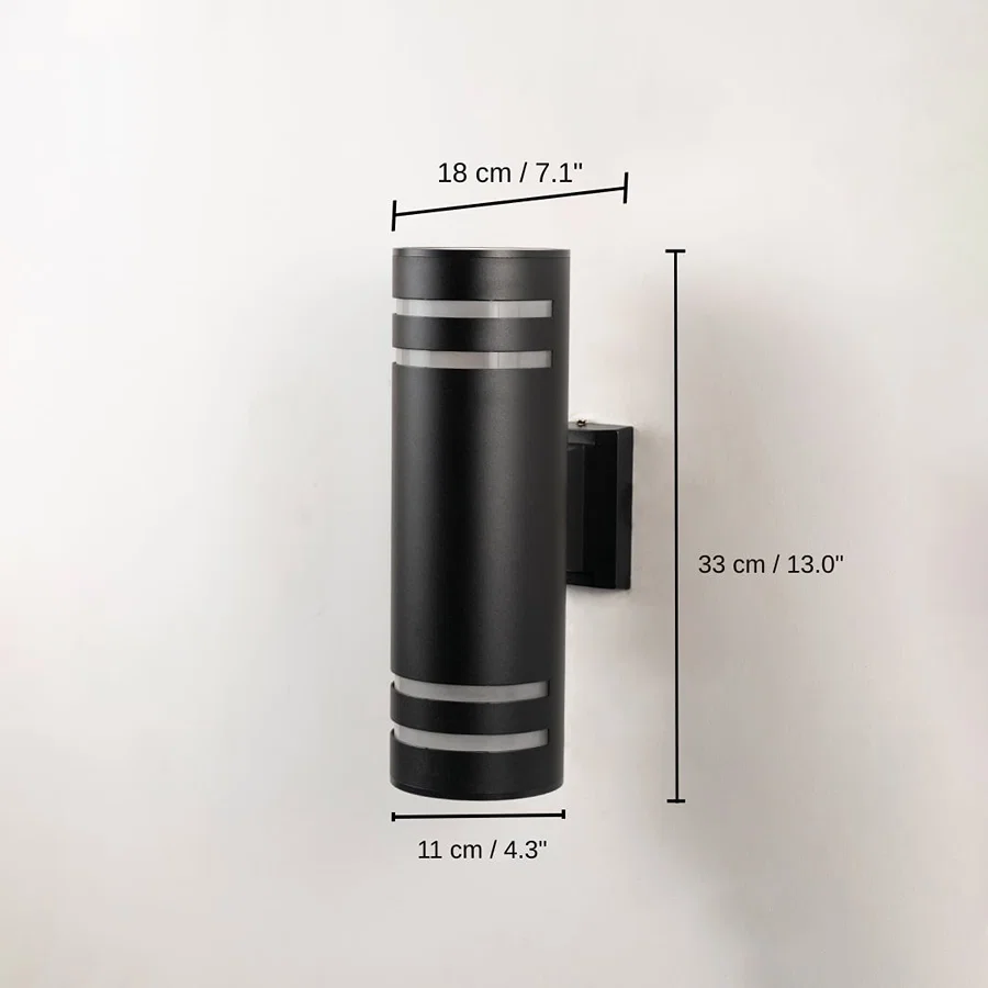 Black cylindrical wall light, 33 x 11 x 18 cm (13.0 x 4.3 x 7.1 inches) dimensions