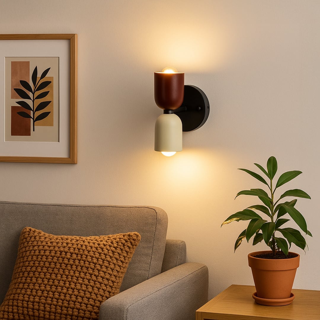 Red and green up-and-down wall lamp beside a sofa