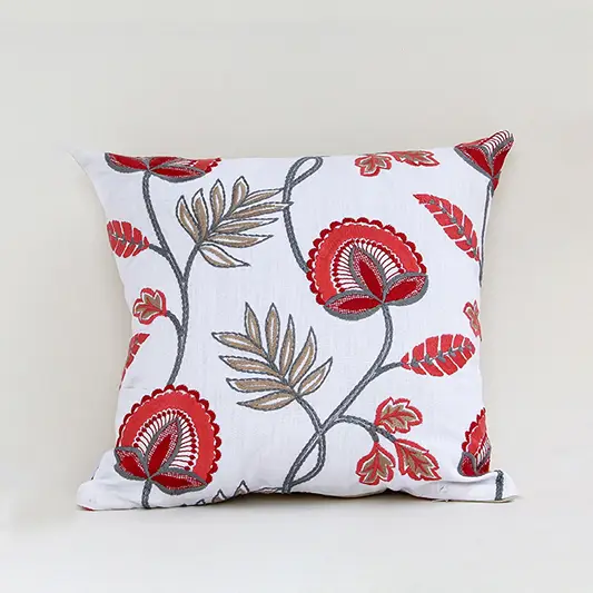 White cotton cushion cover with vibrant red floral print for sofa bedroom seating and stylish home decor accents.