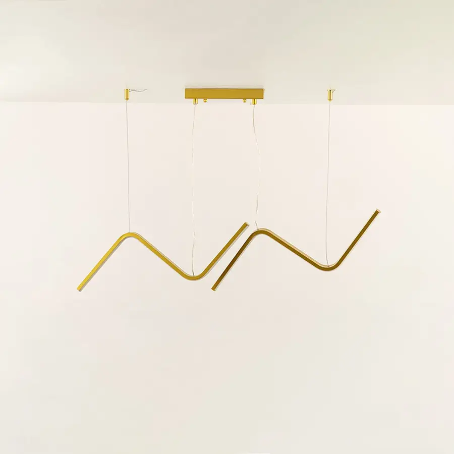 Gold wave LED chandelier featuring curved LED bars creating warm ambient illumination perfect for luxury dining rooms and high end interior lighting design.