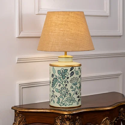 Wild Roses patterned light illuminated on white background showing floral detailing soft light diffusion and charming interior decor style.