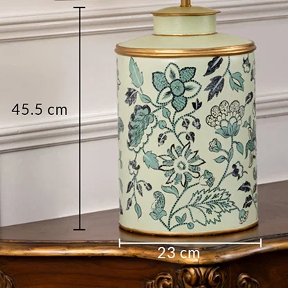 Table lamp showcasing a teal floral ceramic base illustrated with 45.5 cm height and 23 cm width dimensions.