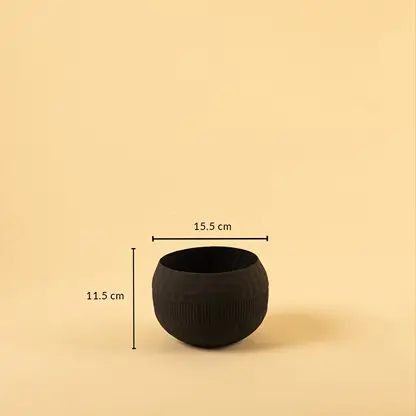 Black metal textured bowl decor with width 15.5 cm and height 11.5 cm shown for accurate sizing.
