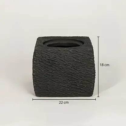 Black ceramic planter measuring 18 cm height and 22 cm width for modern tabletop decor styling placement.