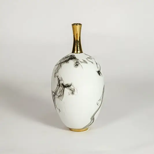 White ceramic decorative vase with grey marble design and gold neck for elegant tabletop styling and home decor.