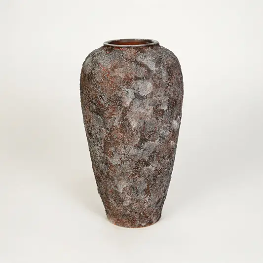 White background image of black ceramic decorative vase for elegant floor placement with textured matte finish.