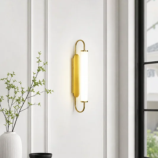 Modern gold metal LED wall light for bedroom hallway living room and luxury home interiors with warm ambient lighting.