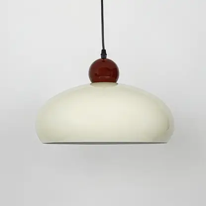 Elegant cream and burgundy pendant light suspended on white background for stylish dining room decor styling.