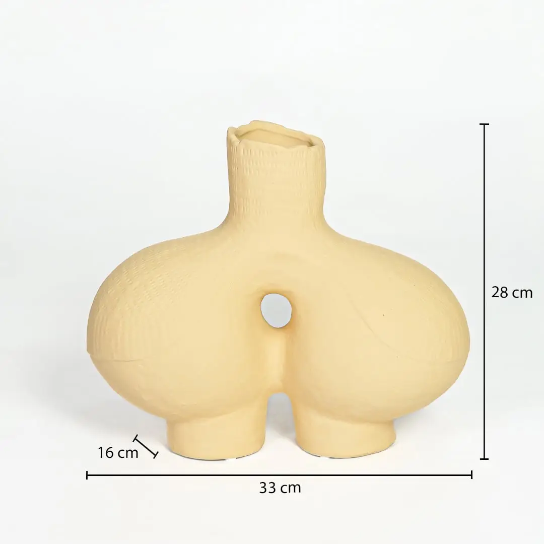 Beige ceramic abstract vase 28 cm height 33 cm width ideal for console table and living room decor.